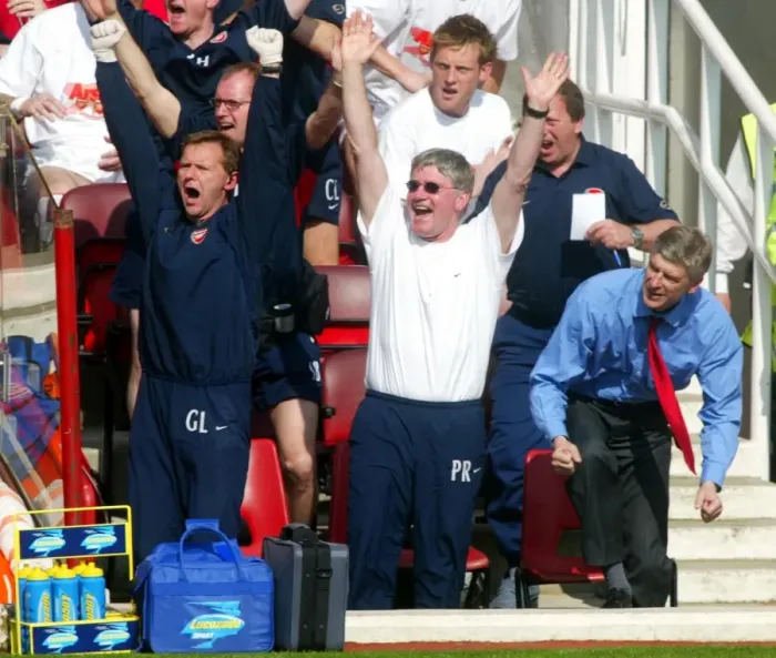 Framed Print : Champions League Bound: Arsenal's Triumphant Trio - Pat Rice, Gary Lewin, and Arsene Wenger Celebrate 2:1 Win Over Leicester City