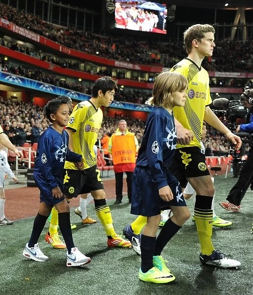 Champions League Clash: Arsenal FC vs Borussia Dortmund - Player Escorts (2011-12)