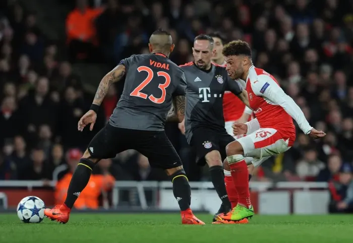 Framed Print : Champions League Clash: Oxlade-Chamberlain vs. Vidal - Arsenal vs. Bayern's Intense Battle (2016-17) Framed Print : Champions League Clash: Oxlade-Chamberlain vs. Vidal - Arsenal vs. Bayern's Intense Battle (2016-17)