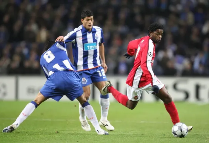 Framed Print : Champions League Showdown: Lucho and Hulk of FC Porto Outshine Alex Song of Arsenal in a 2:0 Victory
