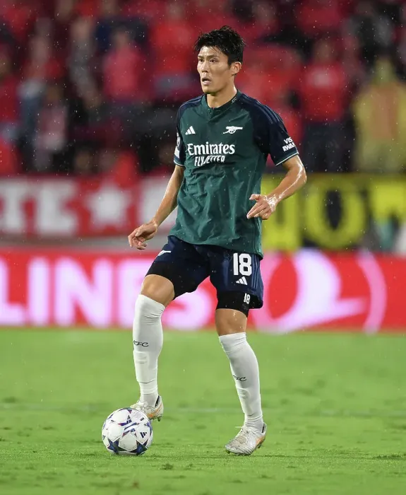 Framed Print : Champions League Showdown: Tomiyasu's Standout Performance - Sevilla vs. Arsenal (2023-24)