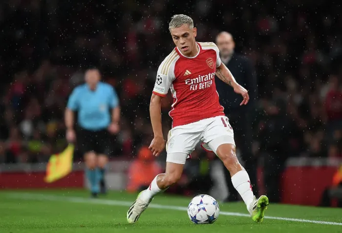 Framed Print : Champions League Thriller: Trossard's Epic Dash at Arsenal's Emirates Stadium