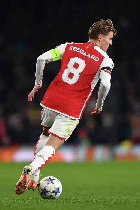 Framed Print : Charging Ahead: Martin Odegaard's Determined Push in Arsenal's UEFA Champions League Battle against RC Lens Framed Print : Charging Ahead: Martin Odegaard's Determined Push in Arsenal's UEFA Champions League Battle against RC Lens