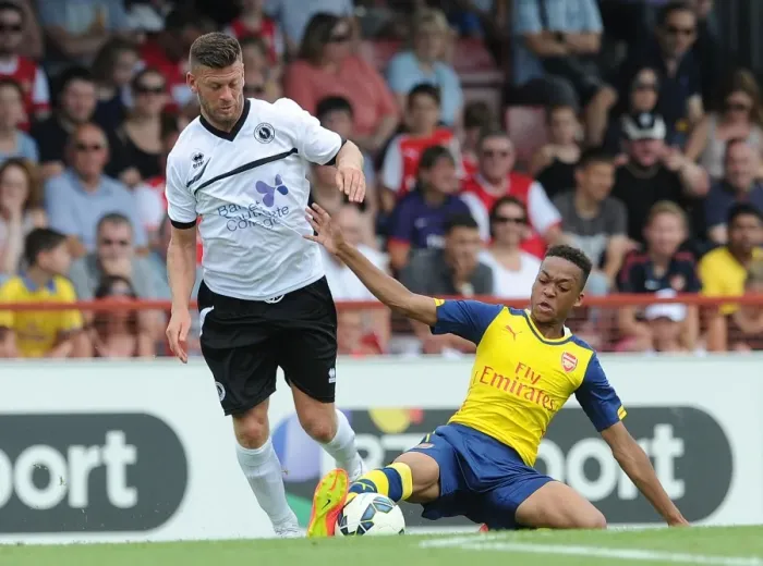 Framed Print : Chris Willock vs Luke Garrard: Battle in Pre-Season Friendly Between Boreham Wood and Arsenal Framed Print : Chris Willock vs Luke Garrard: Battle in Pre-Season Friendly Between Boreham Wood and Arsenal