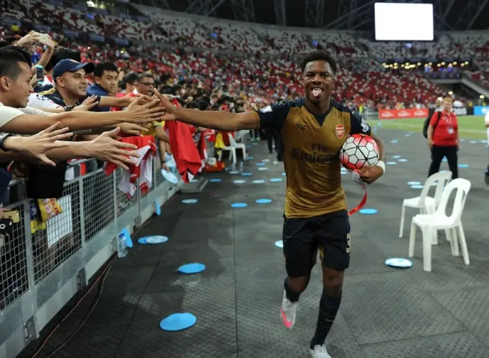 Framed Print : Chuba Akpom Scores and Celebrates with Arsenal Fans in Singapore