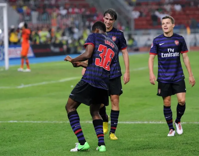 Framed Print : Chuks Aneke celebrates scoring Arsenals 2nd goal. Malaysia 1: 2 Arsenal
