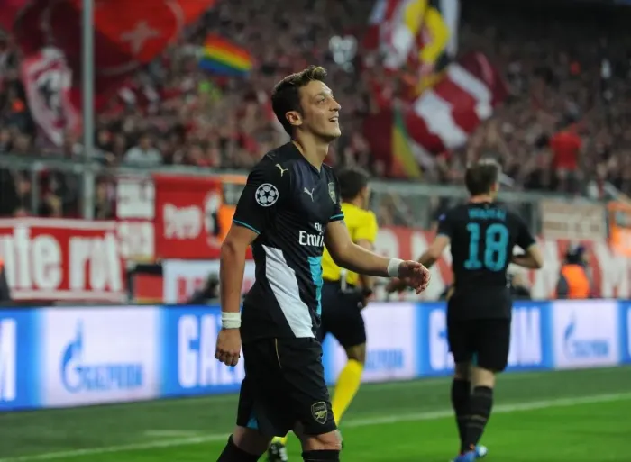 Framed Print : Clash at the Allianz Arena: Mesut Ozil Faces His Former Team - Bayern Munich vs Arsenal, UEFA Champions League