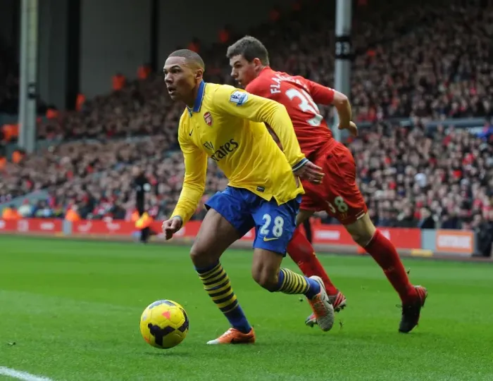 Framed Print : Clash at Anfield: Gibbs vs. Flanagan in Premier League Showdown