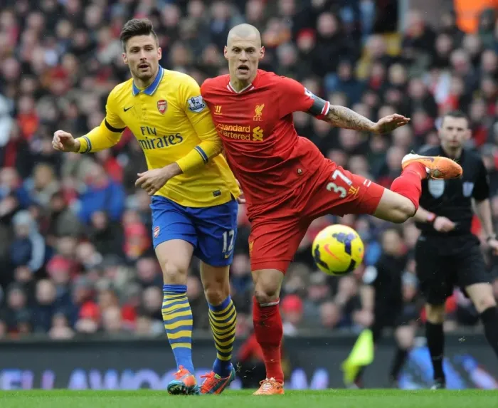 Framed Print : Clash at Anfield: Giroud vs. Skrtel, Liverpool vs. Arsenal, Premier League 2013-14