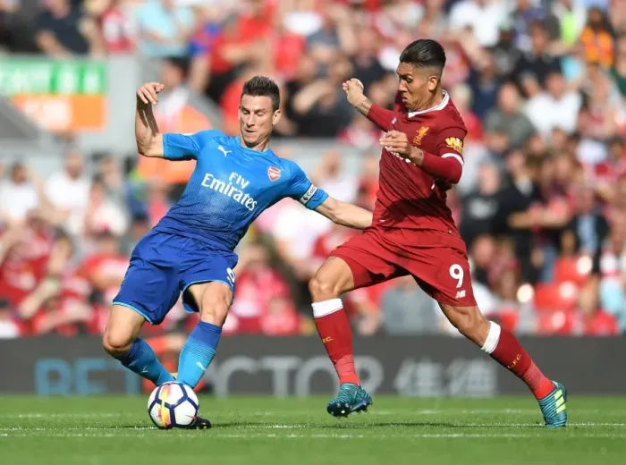 Framed Print : Clash at Anfield: Koscielny vs. Firmino - Premier League Showdown
