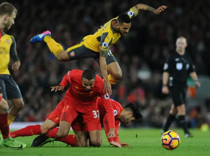 Framed Print : Clash at Anfield: Liverpool vs. Arsenal - Theo Walcott vs. Joel Matip and Emre Can Framed Print : Clash at Anfield: Liverpool vs. Arsenal - Theo Walcott vs. Joel Matip and Emre Can