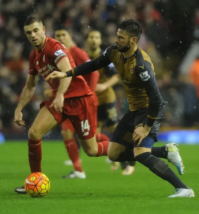 Framed Print : Clash at Anfield: Olivier Giroud vs. Jordan Henderson - Premier League Showdown Framed Print : Clash at Anfield: Olivier Giroud vs. Jordan Henderson - Premier League Showdown