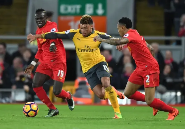Framed Print : Clash at Anfield: Oxlade-Chamberlain vs. Mane & Clyne - Premier League Showdown