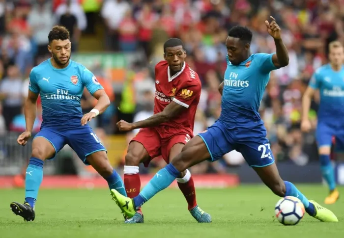 Framed Print : Clash at Anfield: Oxlade-Chamberlain and Welbeck Go Head-to-Head with Wijnaldum