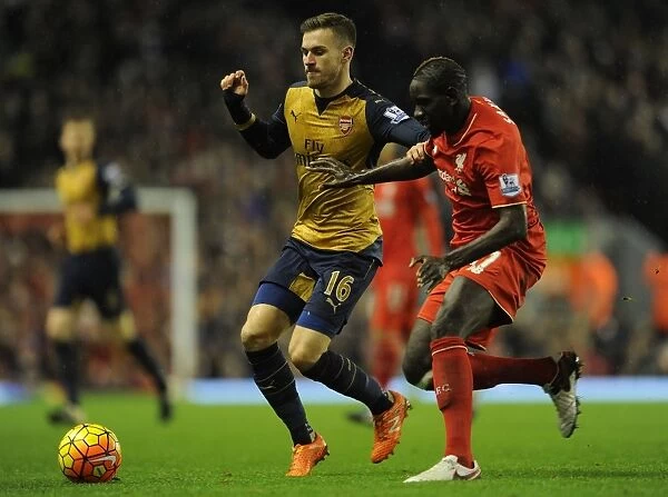Clash at Anfield: Ramsey vs. Sakho - Premier League 2015-16: Intense Battle Between Arsenal's Ramsey and Liverpool's Sakho