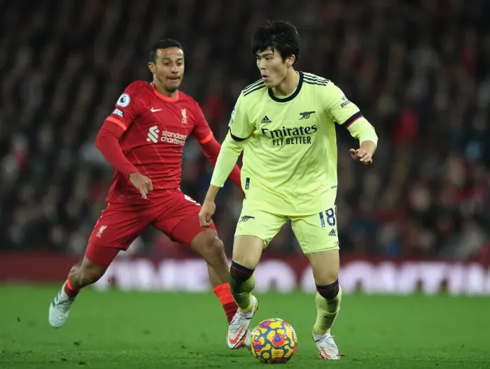 Framed Print : Clash at Anfield: Tomiyasu vs. Thiago