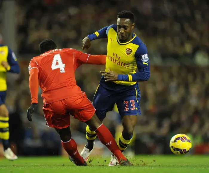 Framed Print : Clash at Anfield: Welbeck vs. Toure - A Football Rivalry Ignites