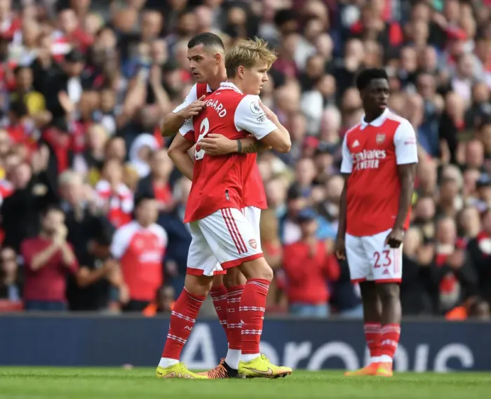 Framed Print : Clash of the Arsenal Midfield Titans: Xhaka vs. Odegaard - Arsenal FC vs. Tottenham Hotspur, 2022-23 Premier League Framed Print : Clash of the Arsenal Midfield Titans: Xhaka vs. Odegaard - Arsenal FC vs. Tottenham Hotspur, 2022-23 Premier League