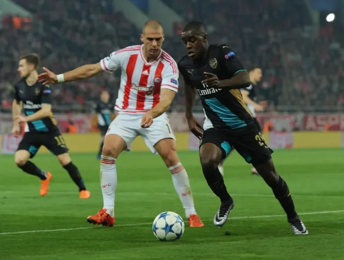 Framed Print : Clash in Athens: Campbell vs. Kasami - Olympiacos vs. Arsenal, UEFA Champions League Framed Print : Clash in Athens: Campbell vs. Kasami - Olympiacos vs. Arsenal, UEFA Champions League