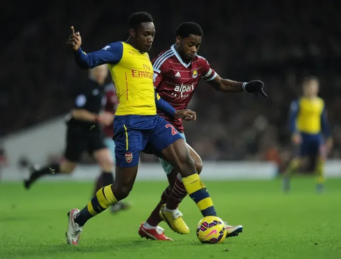 Framed Print : Clash at Boleyn Ground: Welbeck vs. Song in the 2014-15 West Ham United vs. Arsenal Premier League Battle Framed Print : Clash at Boleyn Ground: Welbeck vs. Song in the 2014-15 West Ham United vs. Arsenal Premier League Battle