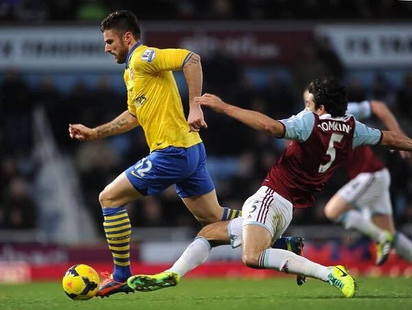 Clash at the Boleyn: Ramsey vs. Tomkins in the Premier League Battle between West Ham and Arsenal