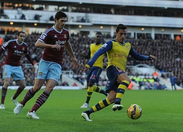 Clash at the Boleyn: Sanchez vs. Tomkins in the 2014-15 West Ham United vs. Arsenal Premier League Match