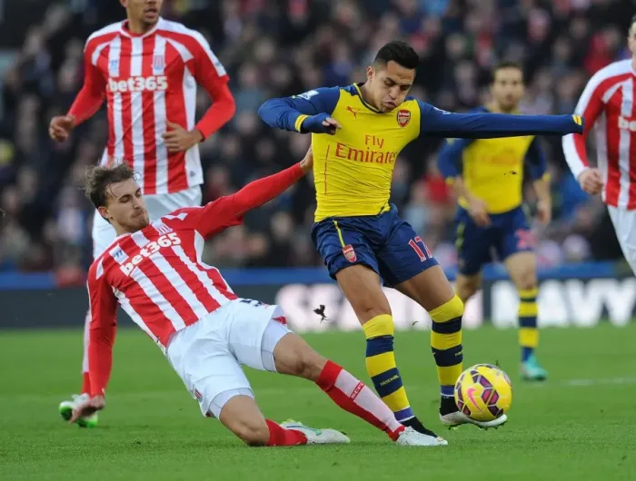 Framed Print : Clash at Britannia: Sanchez vs Muniesa, Premier League Showdown
