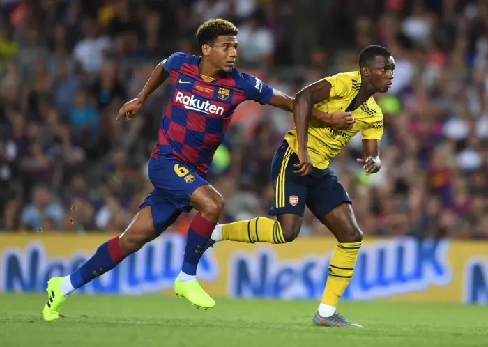 Framed Print : Clash at the Camp: FC Barcelona vs. Arsenal - Pre-Season Battle (2019-20): Eddie Nketiah vs. Jean-Clair Todibo