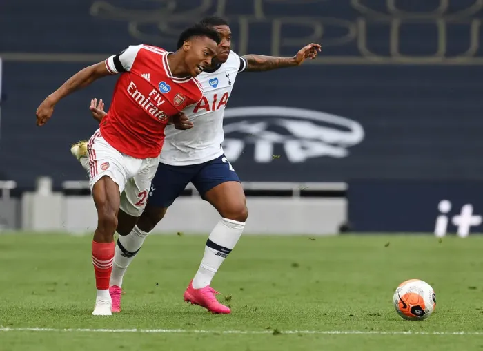 Framed Print : Clash in the Capital: Intense Moment between Joe Willock and Steven Bergwijn in the Premier League Battle between Tottenham and Arsenal (2019-20)