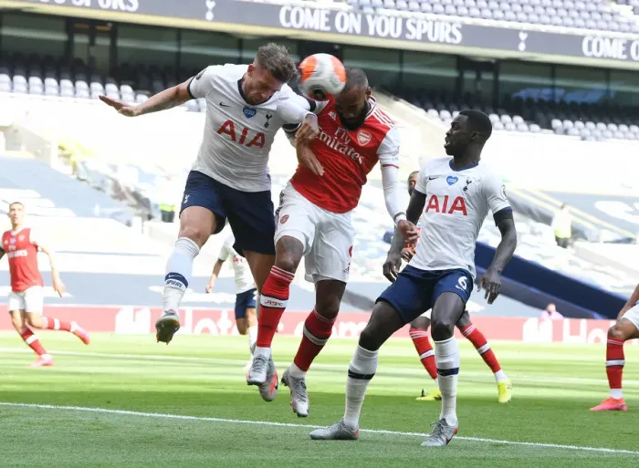 Framed Print : Clash in the Capital: Lacazette vs Alderweireld in the Tottenham-Arsenal Premier League Showdown Framed Print : Clash in the Capital: Lacazette vs Alderweireld in the Tottenham-Arsenal Premier League Showdown