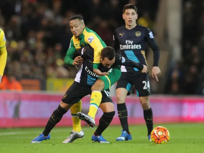 Framed Print : Clash at Carrow Road: Cazorla vs. Olsson - Premier League Battle