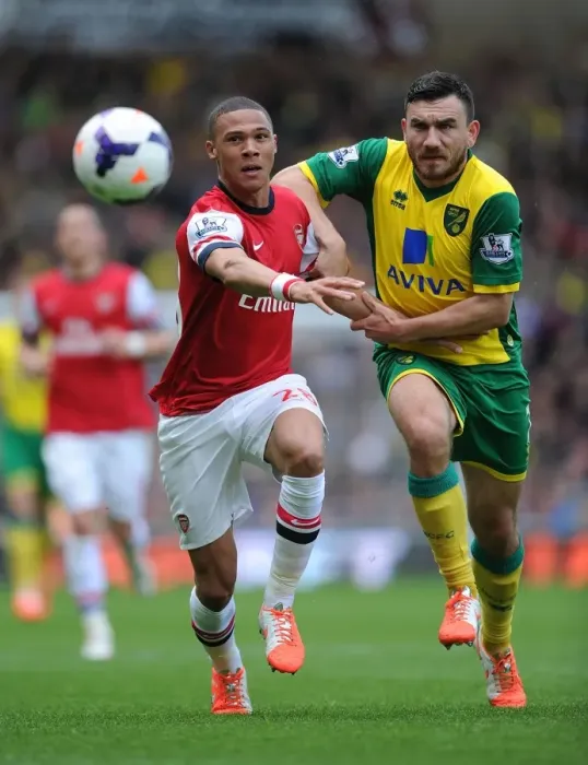 Framed Print : Clash at Carrow Road: Gibbs vs. Snodgrass - Norwich City vs. Arsenal, Premier League 2013-14 Framed Print : Clash at Carrow Road: Gibbs vs. Snodgrass - Norwich City vs. Arsenal, Premier League 2013-14