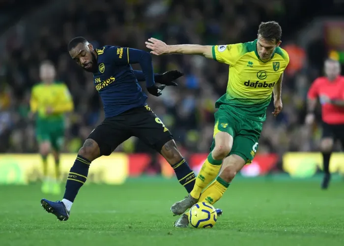 Framed Print : Clash at Carrow Road: Lacazette vs. Zimmermann in Norwich City vs. Arsenal FC, Premier League 2019-20 Framed Print : Clash at Carrow Road: Lacazette vs. Zimmermann in Norwich City vs. Arsenal FC, Premier League 2019-20