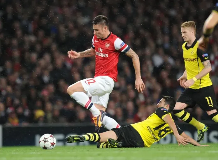 Framed Print : Clash of Champions: Giroud vs. Sahin - Arsenal vs. Borussia Dortmund (2013)