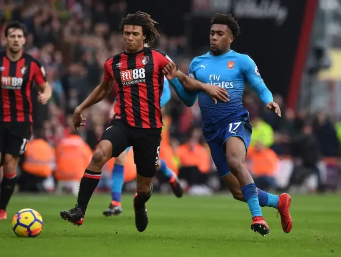Framed Print : Clash of Champions: Iwobi vs Ake in AFC Bournemouth vs Arsenal Premier League Showdown