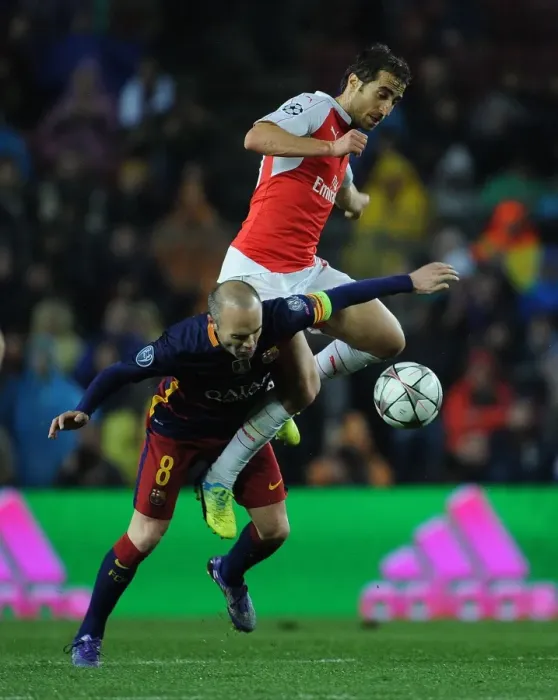 Framed Print : Clash of Champions League Rivals: Flamini vs. Iniesta (2016) - Battle at Camp Nou