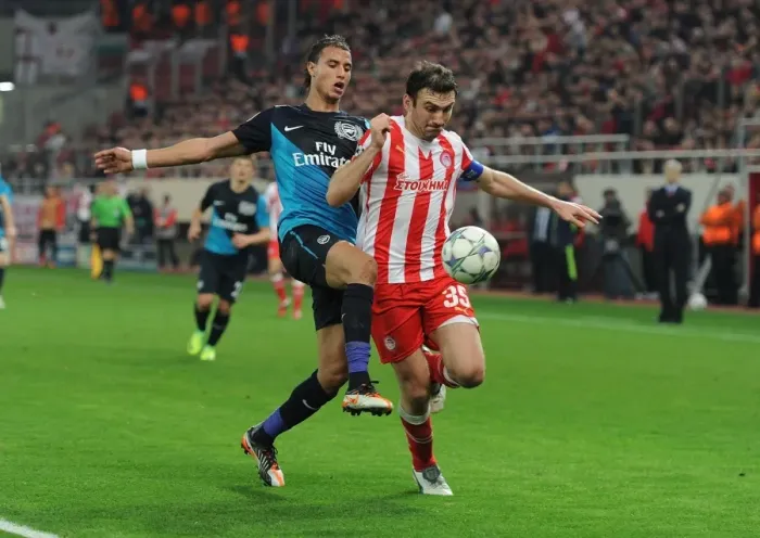 Framed Print : Clash of Champions: Marouane Chamakh vs. Vassilis Torosidis (Olympiacos vs. Arsenal, 2011-12) Framed Print : Clash of Champions: Marouane Chamakh vs. Vassilis Torosidis (Olympiacos vs. Arsenal, 2011-12)