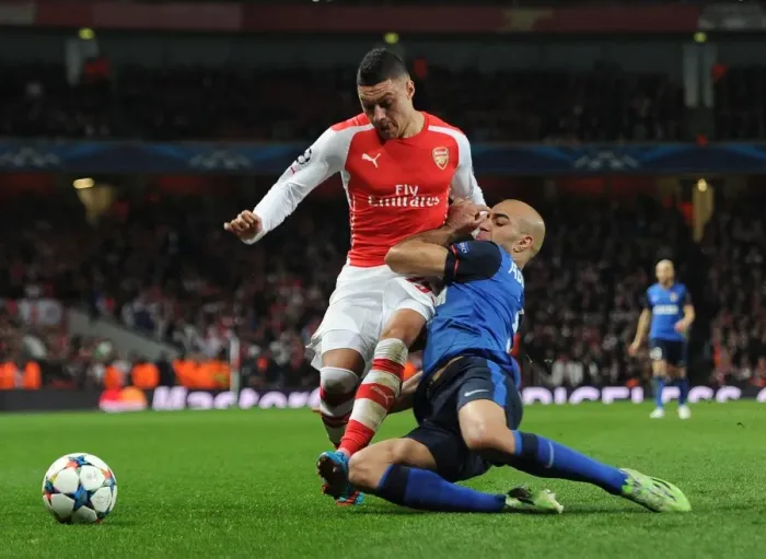 Framed Print : Clash of Champions: Oxlade-Chamberlain vs. Abdennour in Arsenal's UEFA Battle Framed Print : Clash of Champions: Oxlade-Chamberlain vs. Abdennour in Arsenal's UEFA Battle