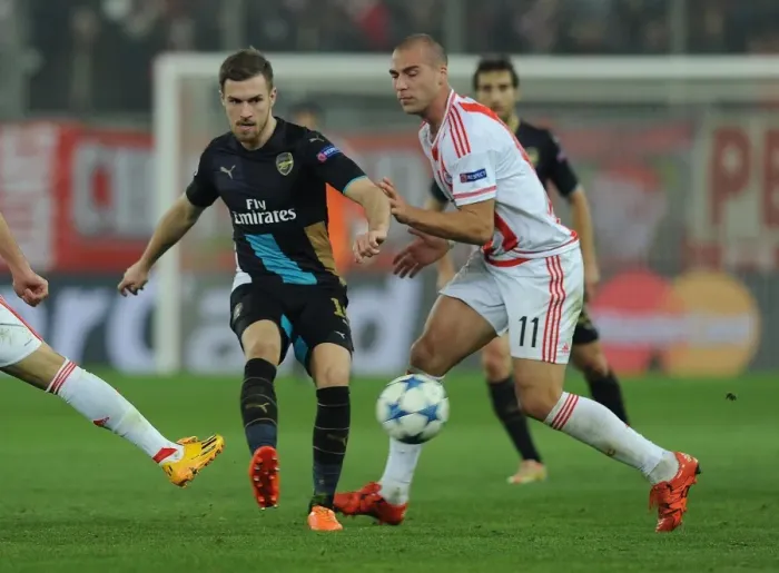 Framed Print : Clash of Champions: Ramsey vs. Kasami - Arsenal vs. Olympiacos Framed Print : Clash of Champions: Ramsey vs. Kasami - Arsenal vs. Olympiacos