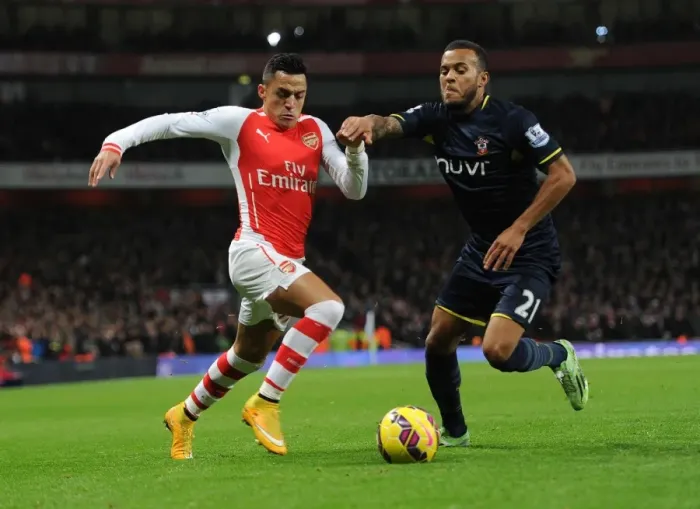 Framed Print : Clash of Champions: Sanchez vs. Bertrand - Arsenal vs. Southampton, Premier League 2014-15