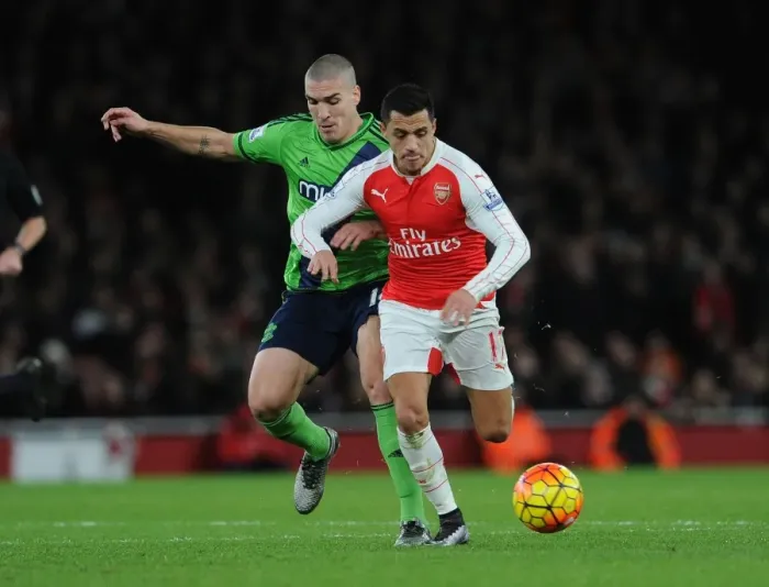 Framed Print : Clash of Champions: Sanchez vs. Romeu - Arsenal's Battle Against Southampton (2015-16)