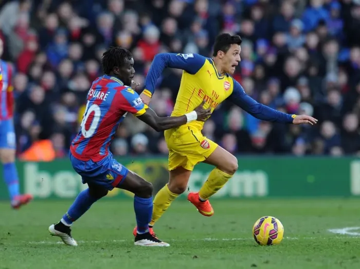 Framed Print : Clash of Champions: Sanchez vs. Souare in Premier League Battle