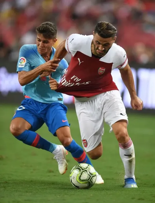 Framed Print : Clash of the Defenders: Sead Kolasinac vs. Oscar Pinchy - Arsenal vs. Atletico Madrid ICC 2018
