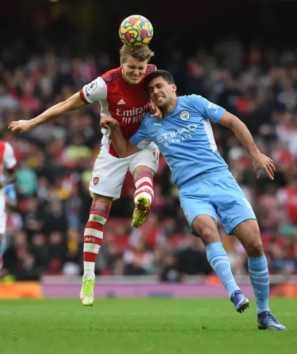 Framed Print : Clash at the Emirates: Arsenal vs Manchester City - A Heading Battle Between Odegaard and Rodri Framed Print : Clash at the Emirates: Arsenal vs Manchester City - A Heading Battle Between Odegaard and Rodri