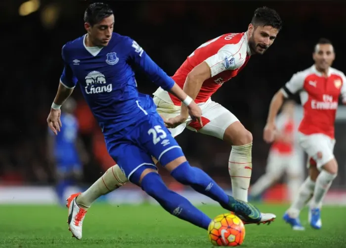 Framed Print : Clash at Emirates: Giroud vs. Funes Mori - A Football Battle