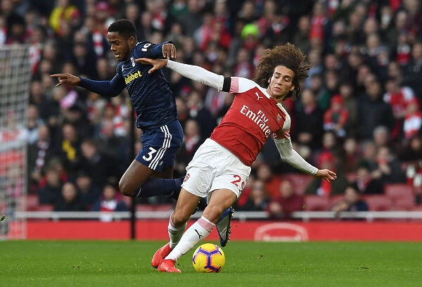 Clash at Emirates: Guendouzi vs Sessegnon in Arsenal's Battle Against Fulham (2018-19)
