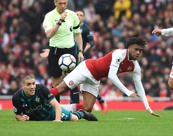 Clash at the Emirates: Iwobi vs. Romeu in Arsenal's Battle Against Southampton