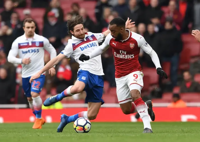 Framed Print : Clash at the Emirates: Lacazette vs. Allen - Arsenal vs. Stoke City, Premier League