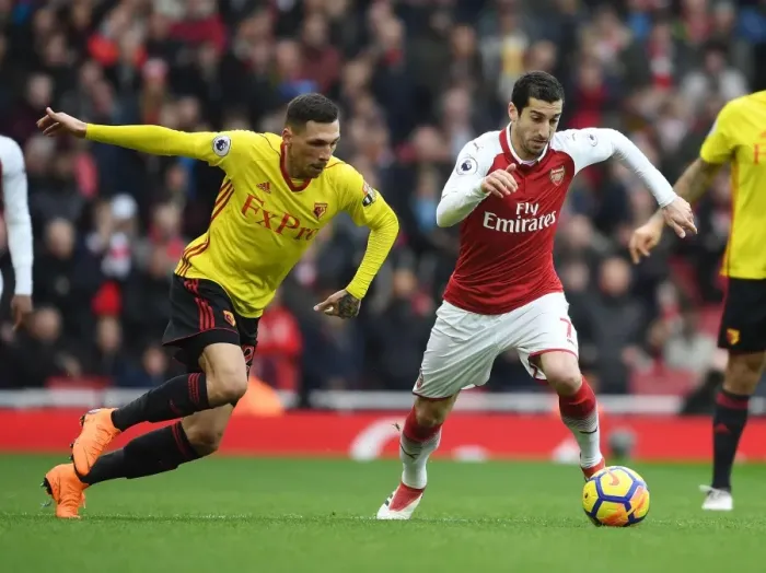 Framed Print : Clash at the Emirates: Mkhitaryan vs Holebas in Arsenal's Battle against Watford