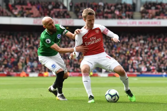 Framed Print : Clash at Emirates: Monreal vs Bruno - Arsenal vs Brighton & Hove Albion, Premier League